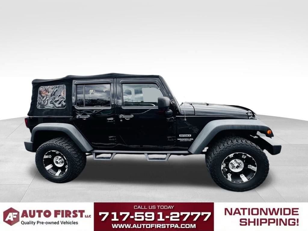 2013 Jeep Wrangler Unlimited Sport photo 2