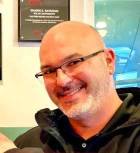 Staff member Shawn Raymond from ID_a0abf3cb44a1