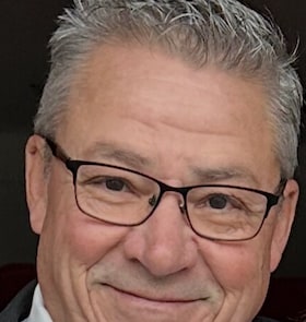 Staff member Joe Adao from ID_9621fec913b9