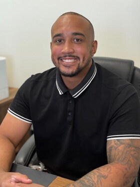 Staff member Treyvon Holman  from ID_a9ffc1