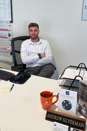 Staff member ANDREW SILVERMAN from 725c272b249b