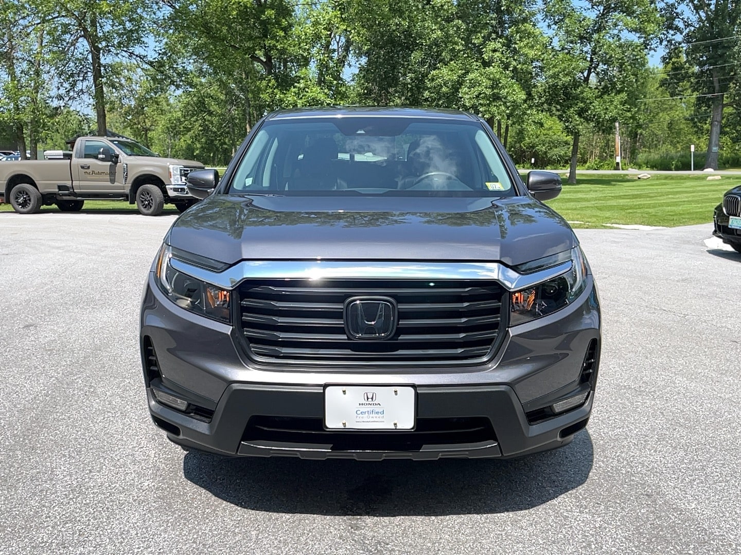 View vehicle photo 3