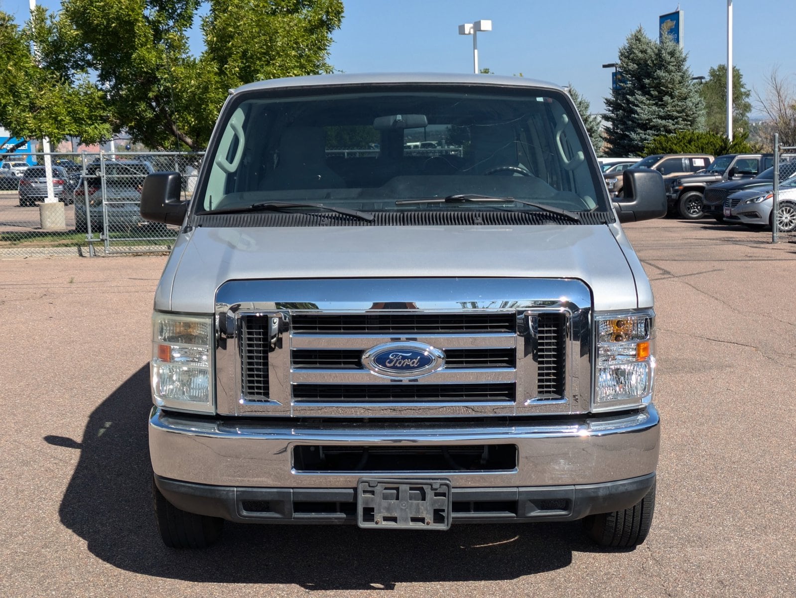 Used 2011 Ford E-Series Econoline Wagon XLT with VIN 1FBNE3BL5BDA64650 for sale in Colorado Springs, CO