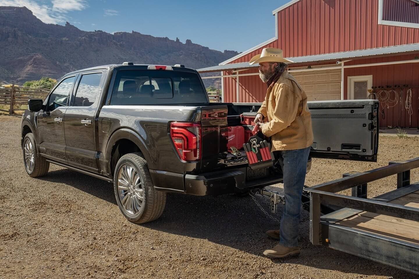 Learn about Which Ford Trucks have a Power Tailgate Exterior shot black F-150 Ford Truck