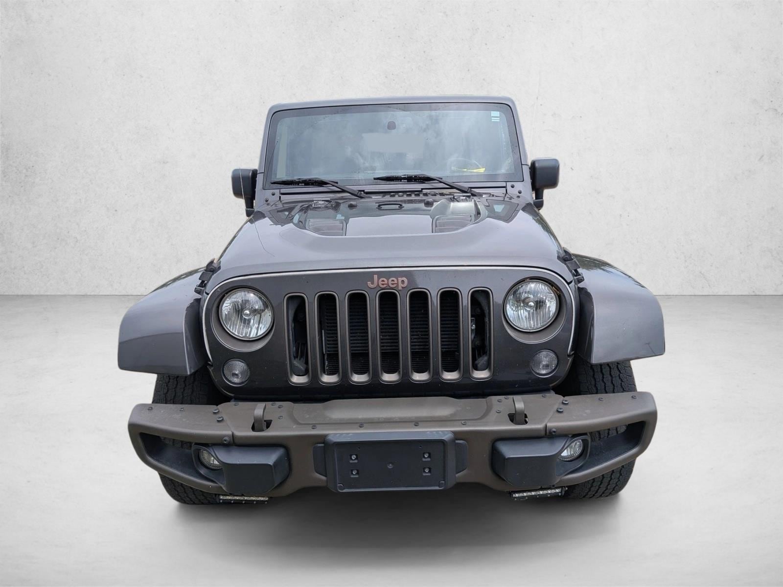 Used 2016 Jeep Wrangler Unlimited 75th Anniversary Edition with VIN 1C4HJWEGXGL328365 for sale in Amherst, OH