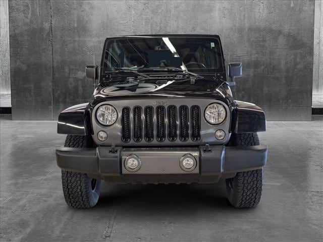 Used 2017 Jeep Wrangler Unlimited Freedom Edition with VIN 1C4BJWDG9HL575241 for sale in Amherst, OH
