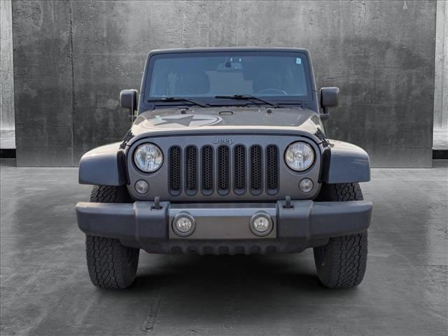 Used 2017 Jeep Wrangler Unlimited Freedom Edition with VIN 1C4BJWDG9HL575241 for sale in Amherst, OH