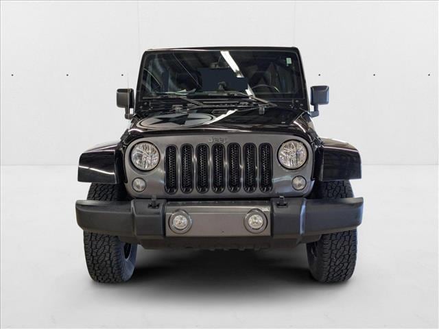 Used 2017 Jeep Wrangler Unlimited Freedom Edition with VIN 1C4BJWDG9HL575241 for sale in Amherst, OH