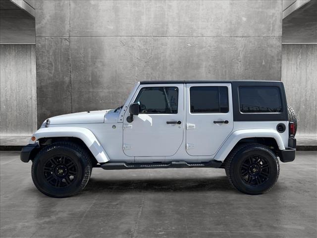 Used 2012 Jeep Wrangler Unlimited Sahara with VIN 1C4HJWEG6CL223137 for sale in Bellevue, WA