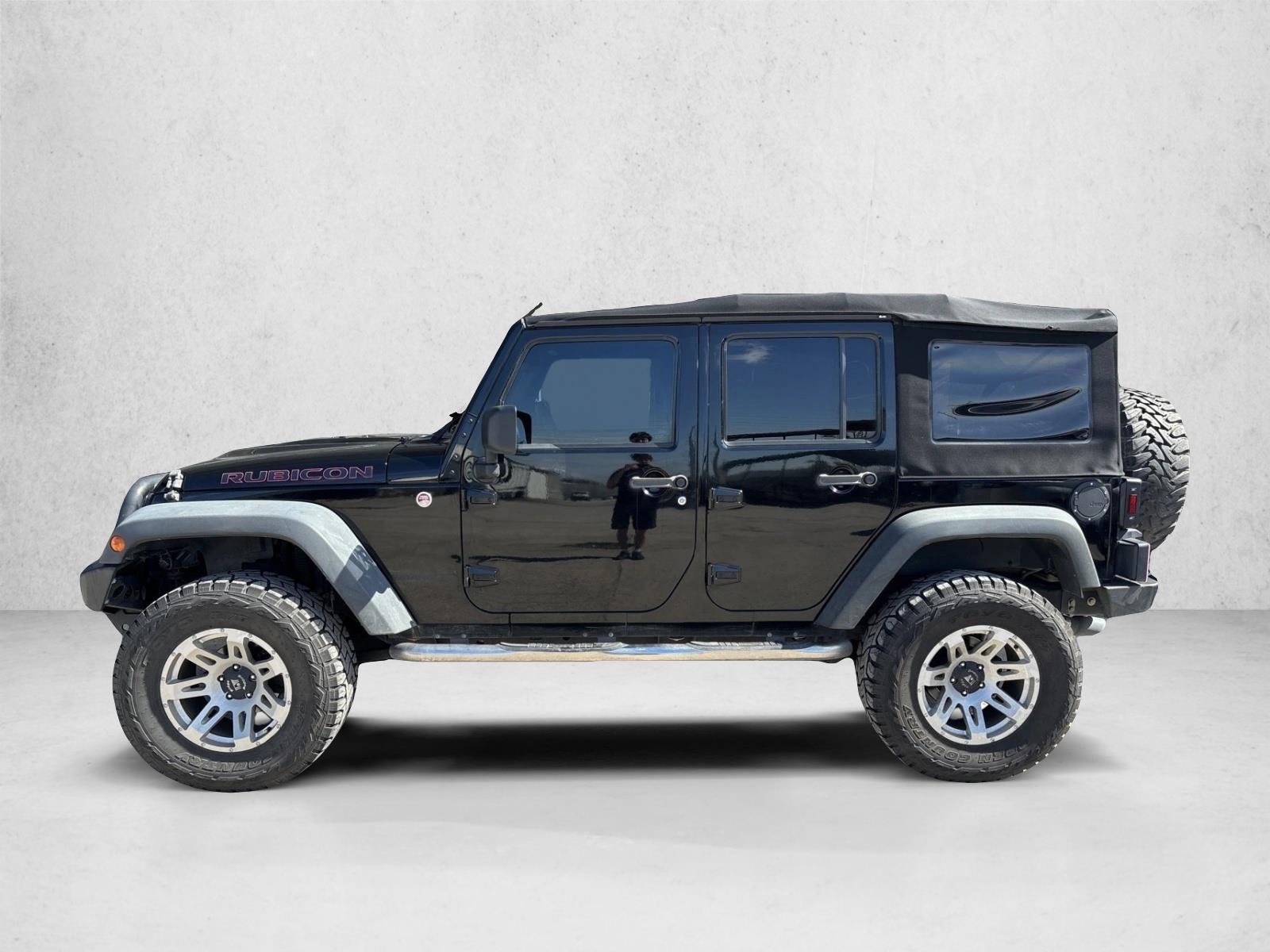 Used 2014 Jeep Wrangler Unlimited Rubicon with VIN 1C4HJWFG5EL234342 for sale in Burleson, TX