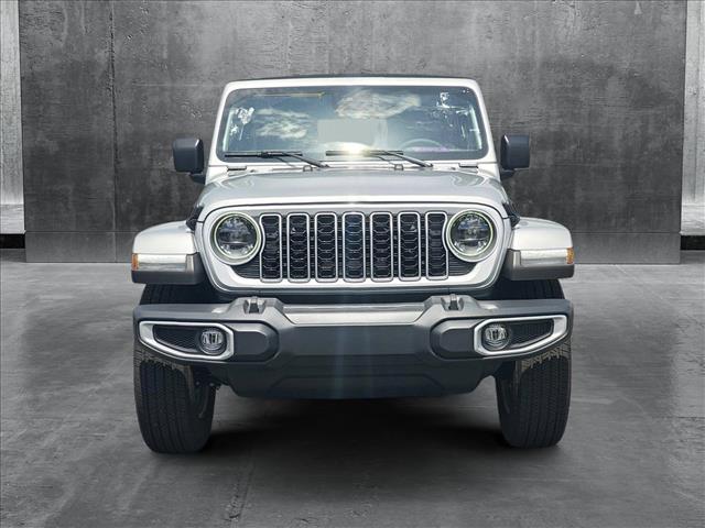 Used 2024 Jeep Wrangler 4-Door Sahara with VIN 1C4PJXEG9RW273510 for sale in Columbus, GA