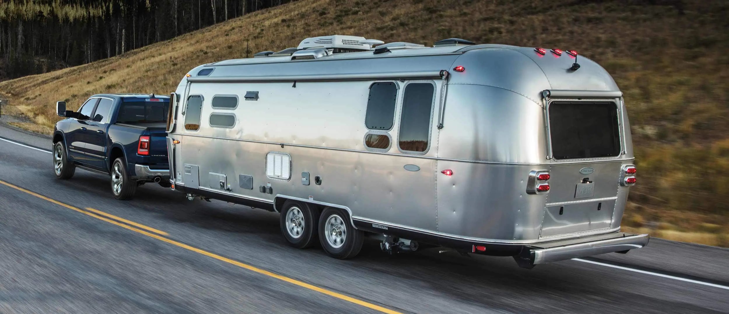 RAM 1500 truck towing a trailer