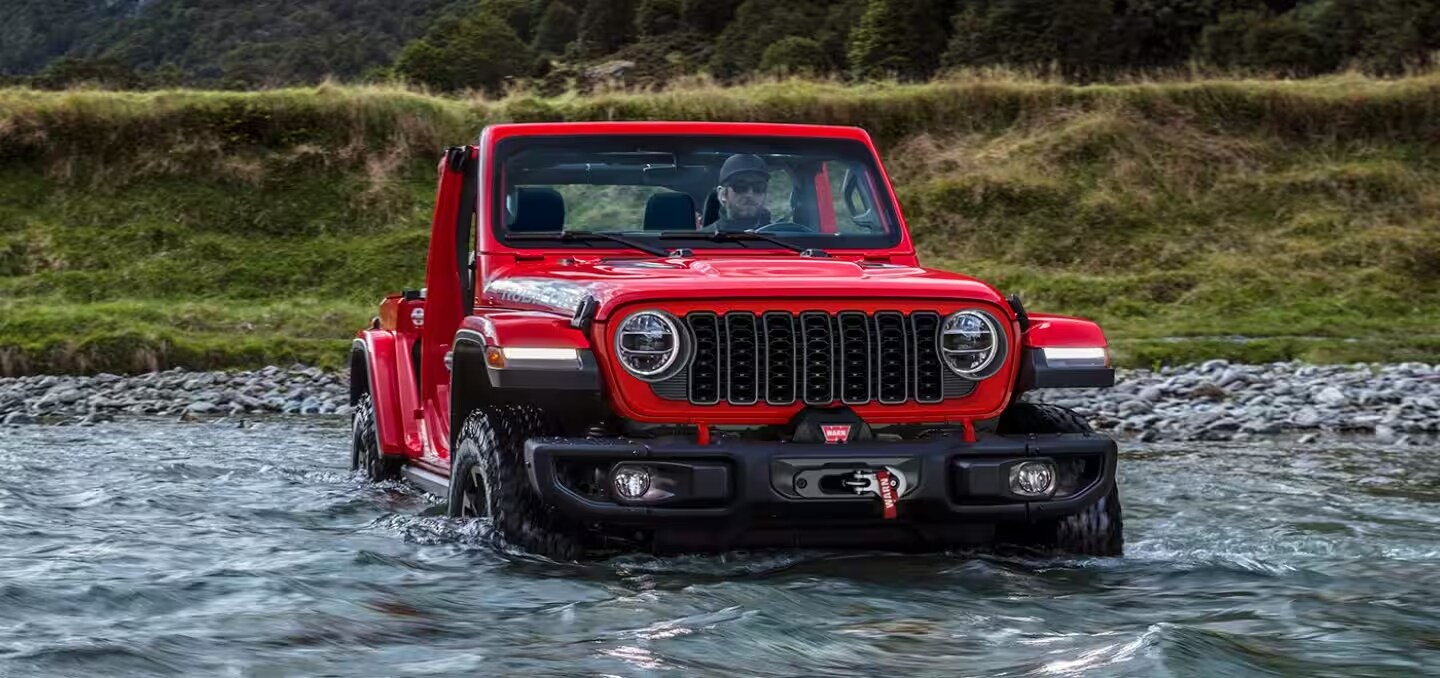 Image of Jeep in river