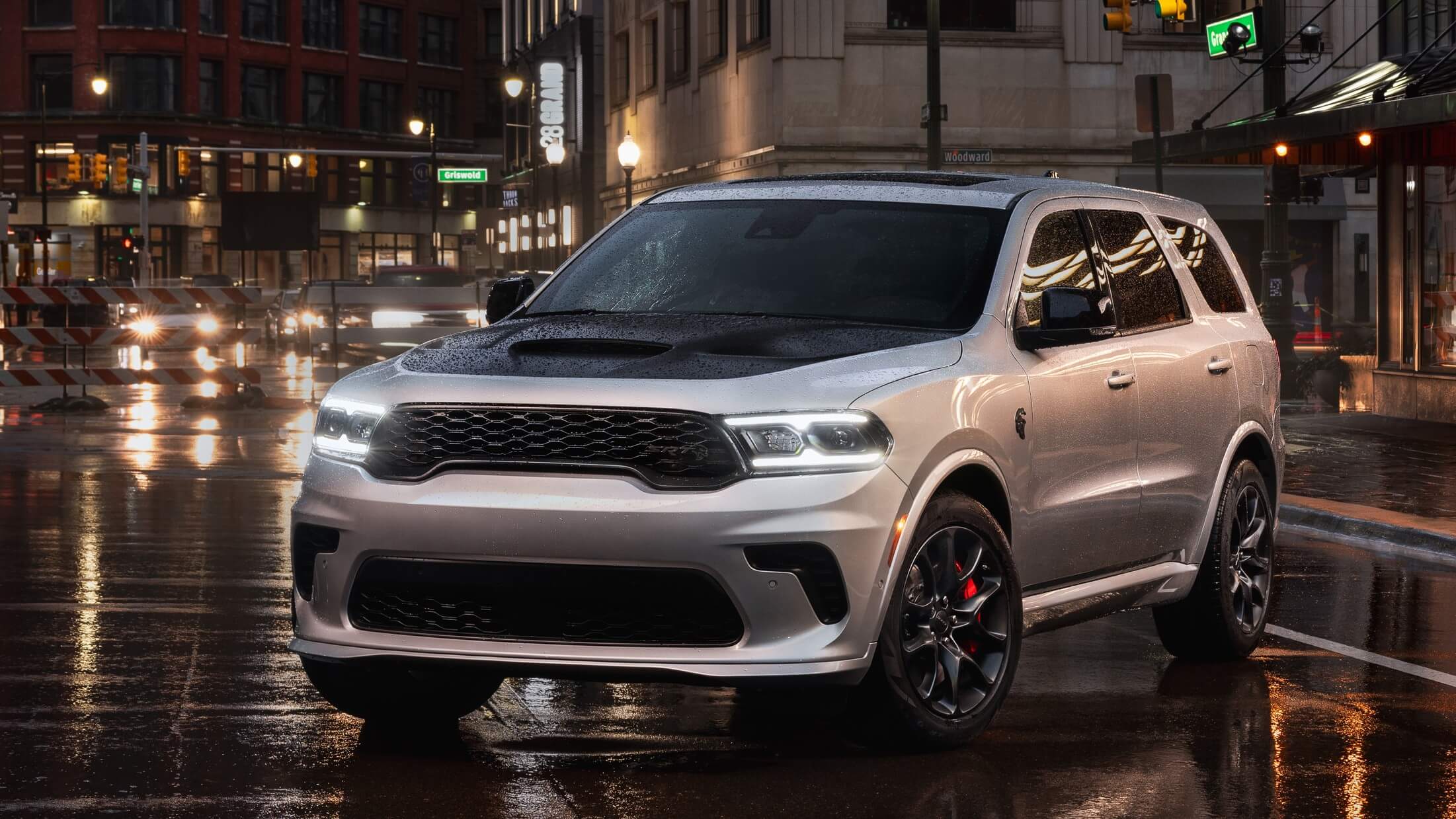 Dodge Durango parked in front of a downtown hotel