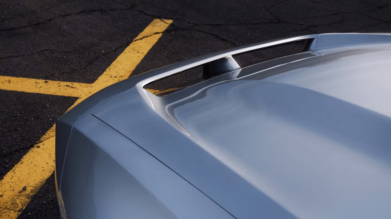 Learn about the 2025 Dodge Charger Daytona An exterior shot of the Dodge Charger Daytona showing the R-Wing, a front air passthrough