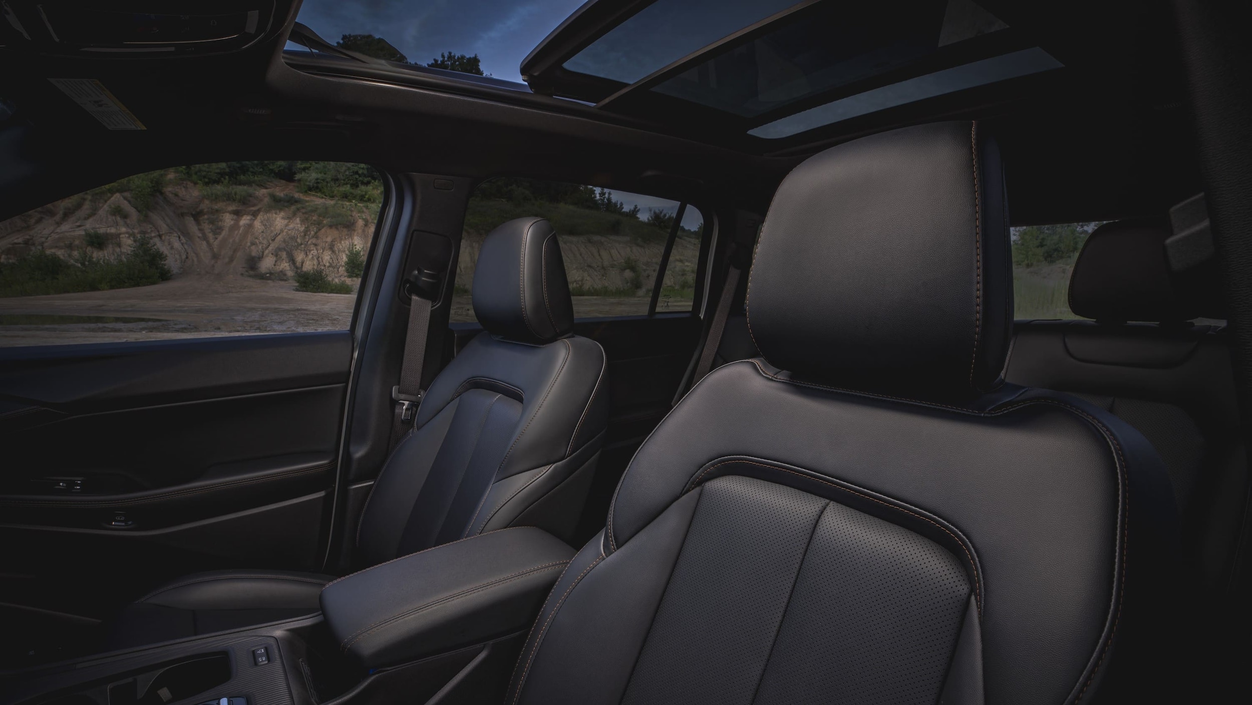  The front seats and the sunroof of the Jeep Cherokee