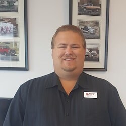 Staff member Travis Mark from ID_e2d77f0ee393