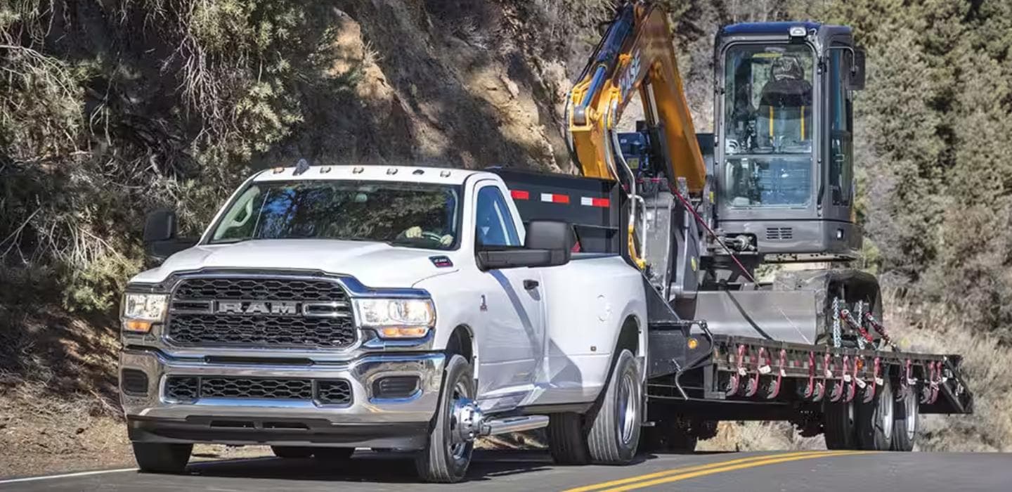 Ram 3500 towing construction equipment