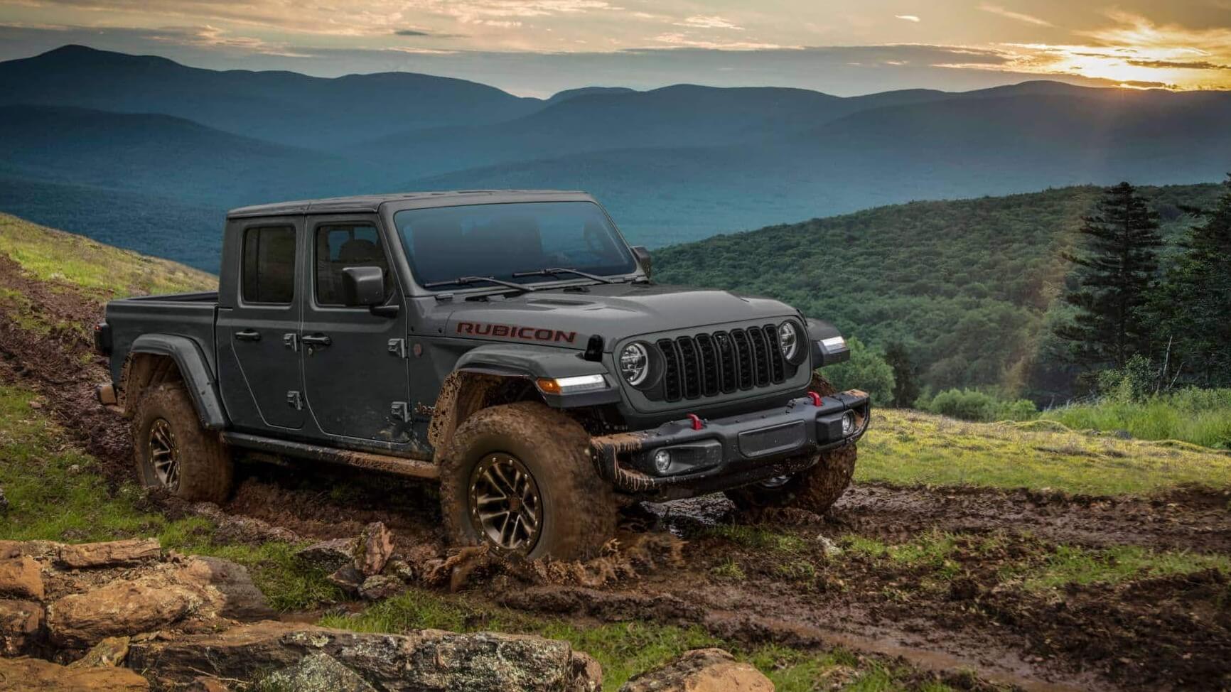 Jeep Gladiator driving through a mud trail