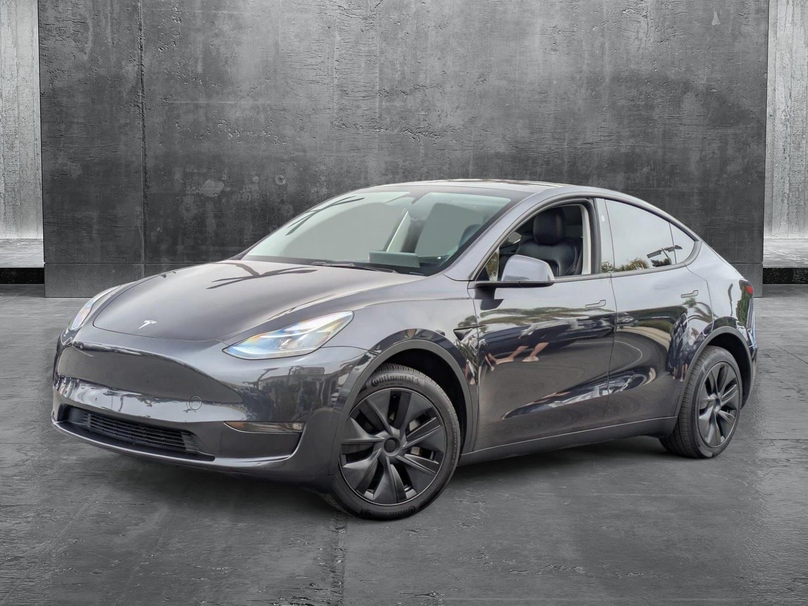 Used 2024 Tesla Model Y Long Range with VIN 7SAYGDEE5RF115978 for sale in Carlsbad, CA