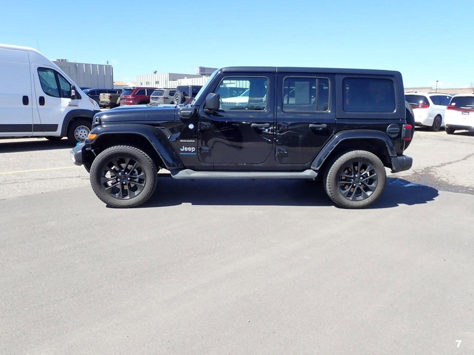 Used 2023 Jeep Wrangler 4xe Sahara 4XE with VIN 1C4JJXP60PW513793 for sale in Englewood, CO