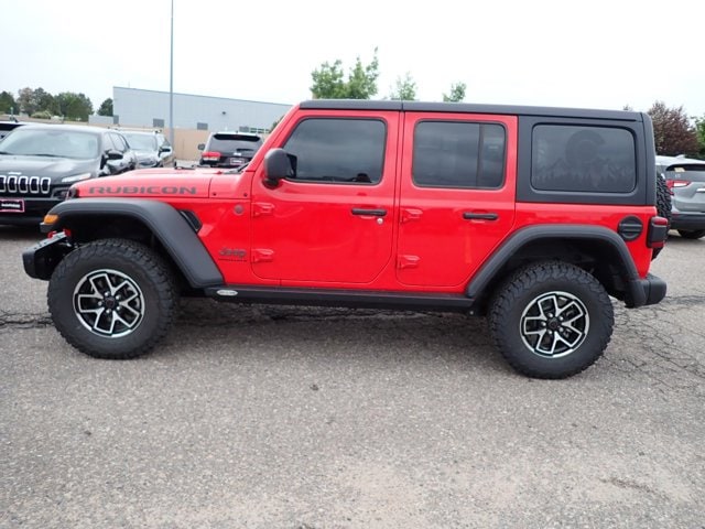 Used 2024 Jeep Wrangler 4-Door Rubicon with VIN 1C4PJXFG7RW327983 for sale in Englewood, CO