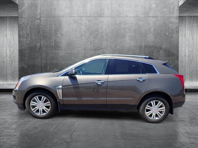 Used 2014 Cadillac SRX Luxury Collection with VIN 3GYFNEE3XES566673 for sale in Englewood, CO