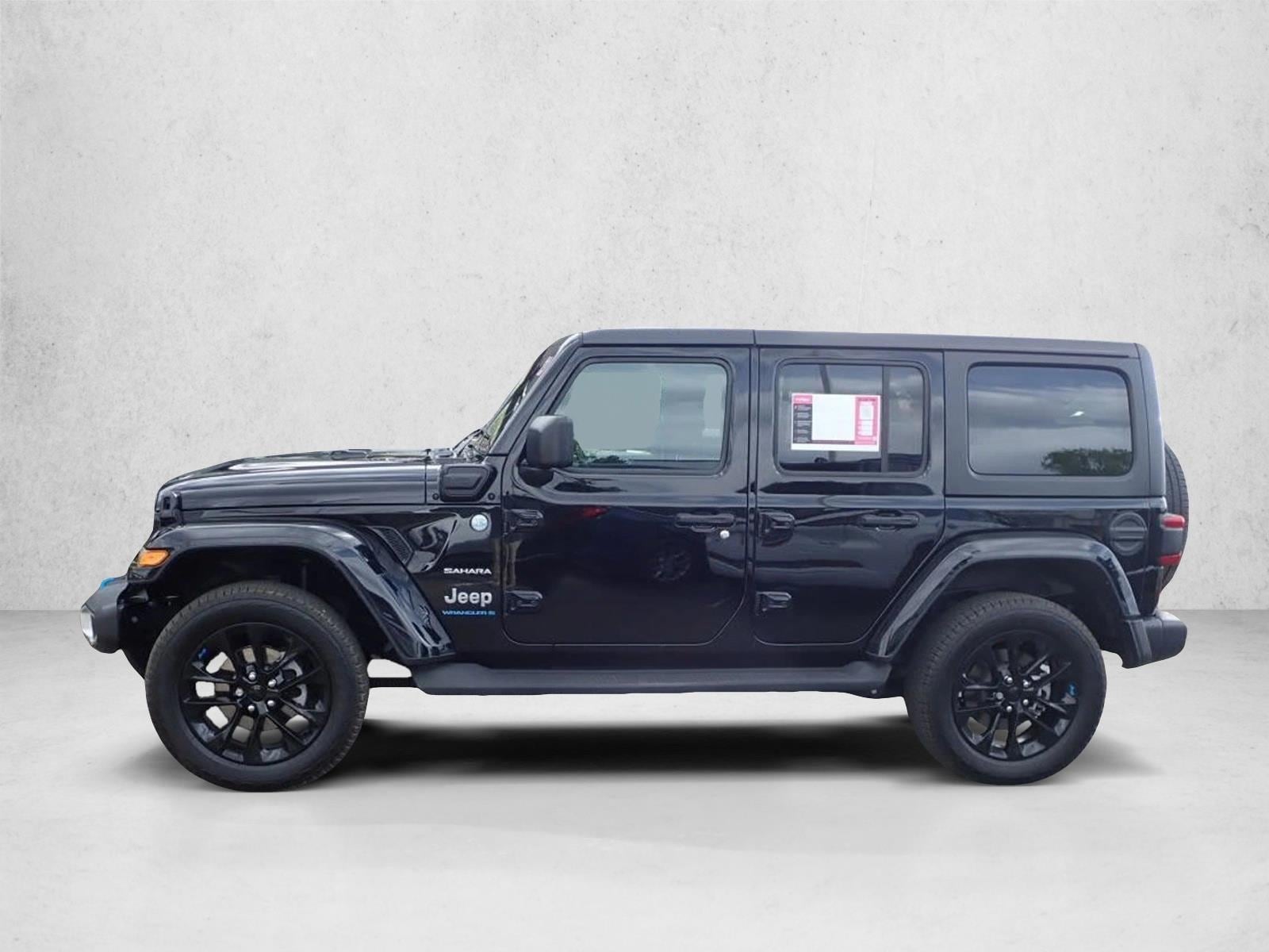 Used 2023 Jeep Wrangler 4xe Sahara 4XE with VIN 1C4JJXP60PW513793 for sale in Englewood, CO