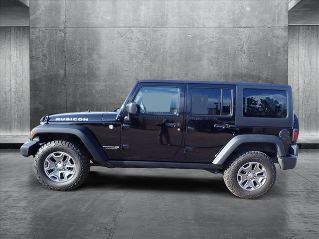 Used 2016 Jeep Wrangler Unlimited Rubicon with VIN 1C4HJWFG0GL159553 for sale in Englewood, CO