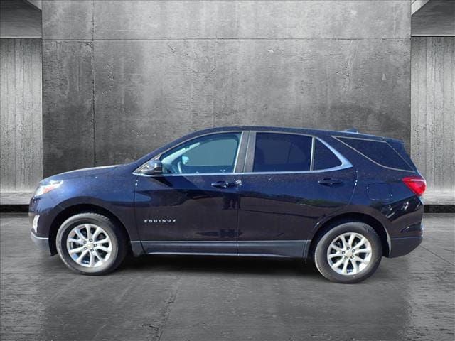 Used 2021 Chevrolet Equinox LT with VIN 2GNAXTEV1M6141203 for sale in Englewood, CO