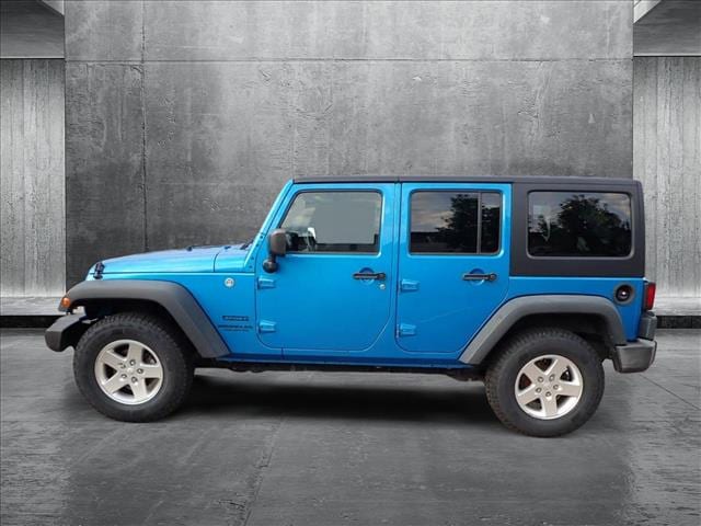 Used 2016 Jeep Wrangler Unlimited Sport S with VIN 1C4BJWDG5GL260046 for sale in Englewood, CO