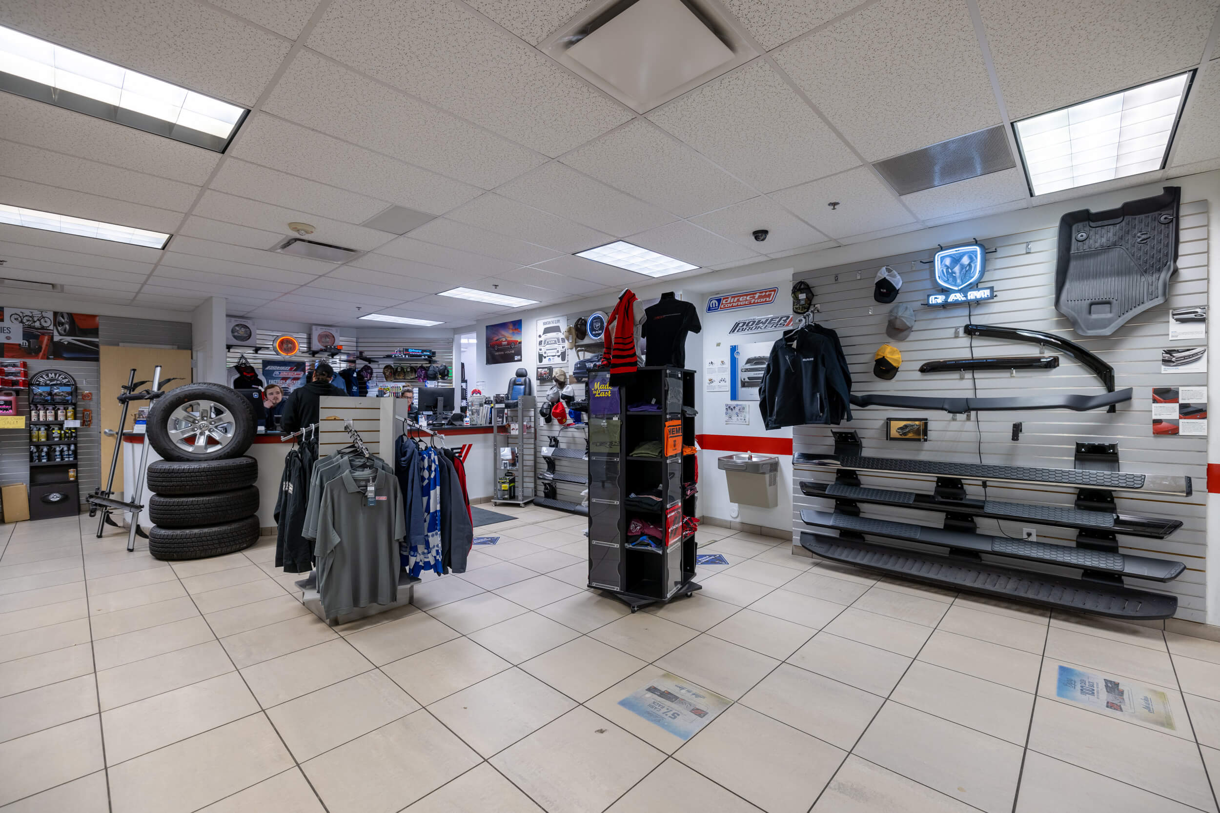 interior view of AutoNation Dodge Ram Broadway parts center with various parts on display