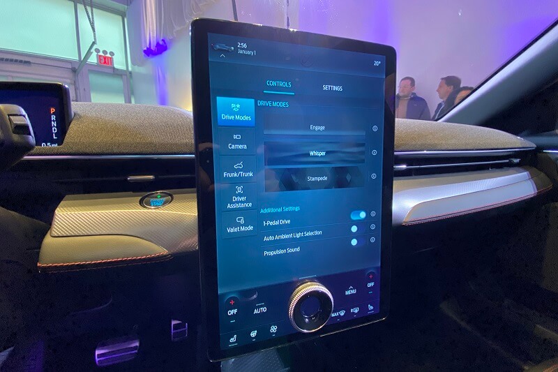Engage, Whisper, and Stampede drive modes displayed on touchscreen of the 2021 Mustang Mach-E.