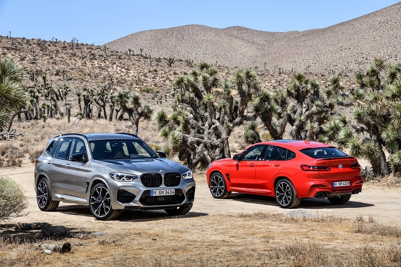 Exterior view of 2021 BMW X3 M and 2021 BMW X4 M