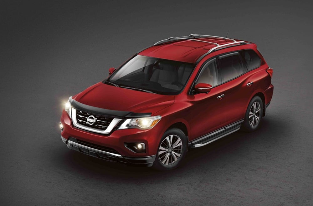 Image of a red Nissan SUV