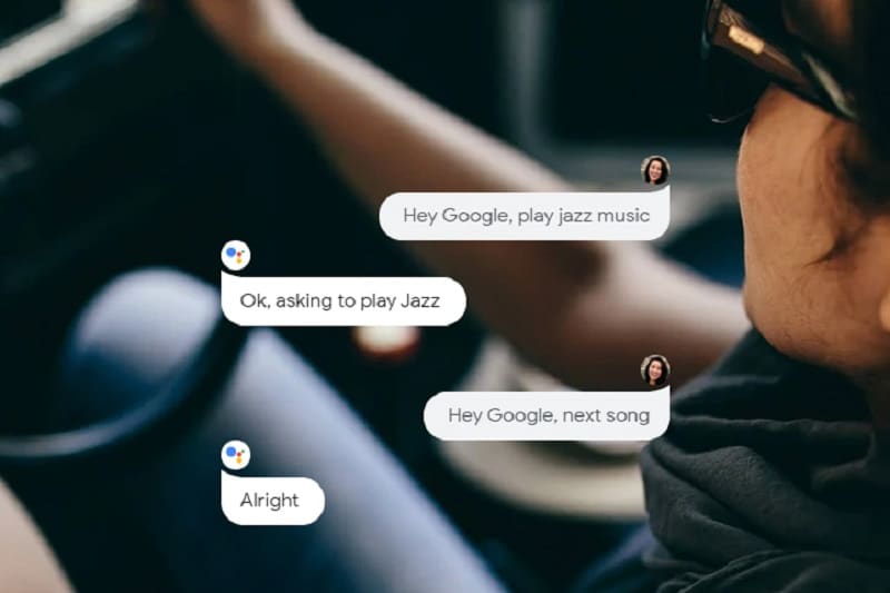 View of person talking to Android Auto with speech bubbles depicting a conversation