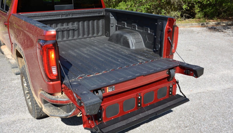 GMC's innovative MultiPro Tailgate, allows easy access to the cargo bed. But you aren't able to use the step if a trailer hitch is connected.