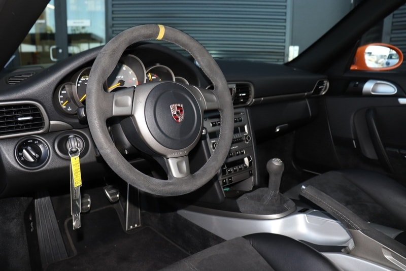 The cabin of GT3 RS is all business. Note the center stripe on the wheel.