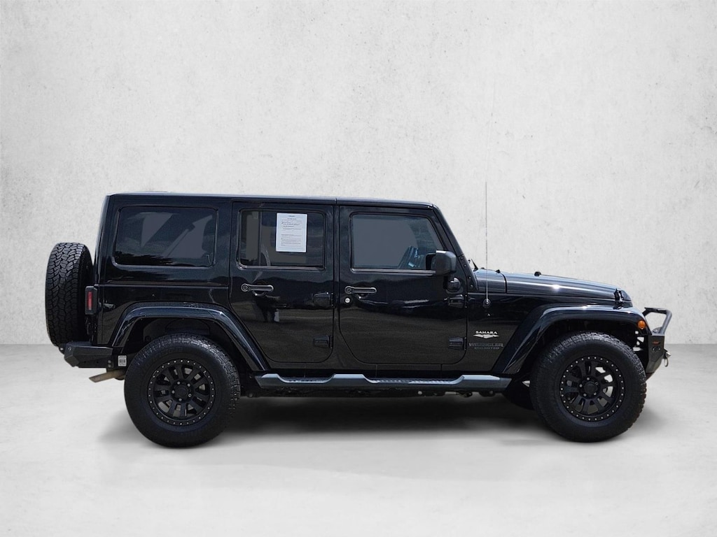 Used 2014 Jeep Wrangler Unlimited Sahara SUV