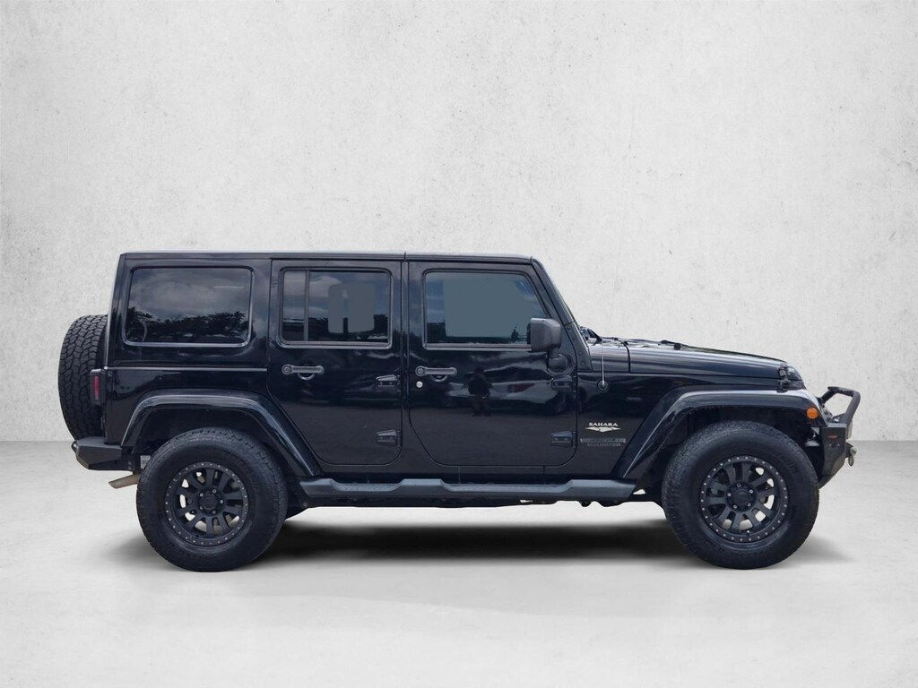 Used 2014 Jeep Wrangler Unlimited Sahara SUV