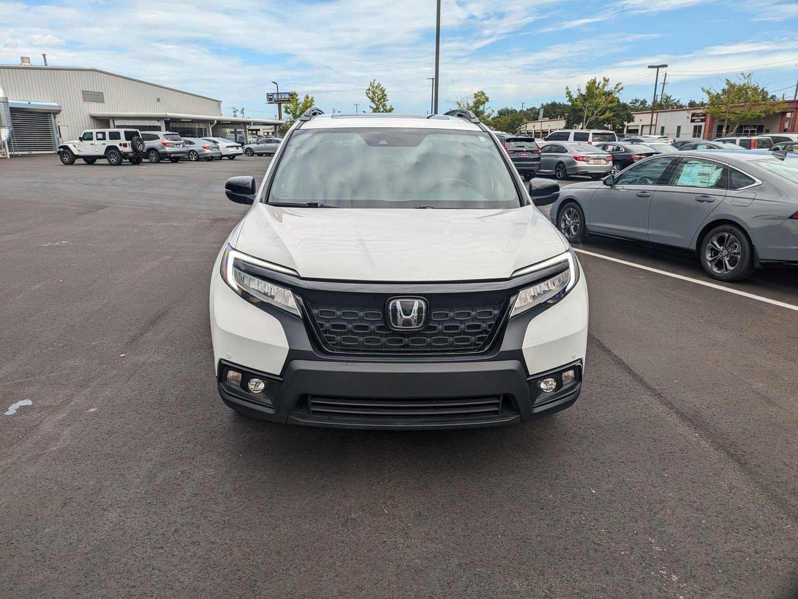 Used 2021 Honda Passport Touring with VIN 5FNYF7H90MB015487 for sale in Mobile, AL