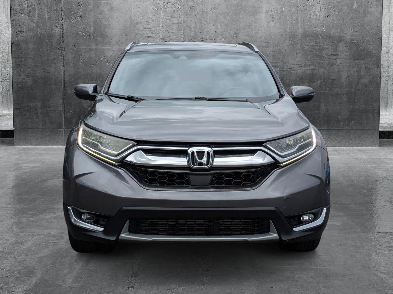 Certified 2017 Honda CR-V Touring with VIN 2HKRW1H9XHH516279 for sale in Clearwater, FL