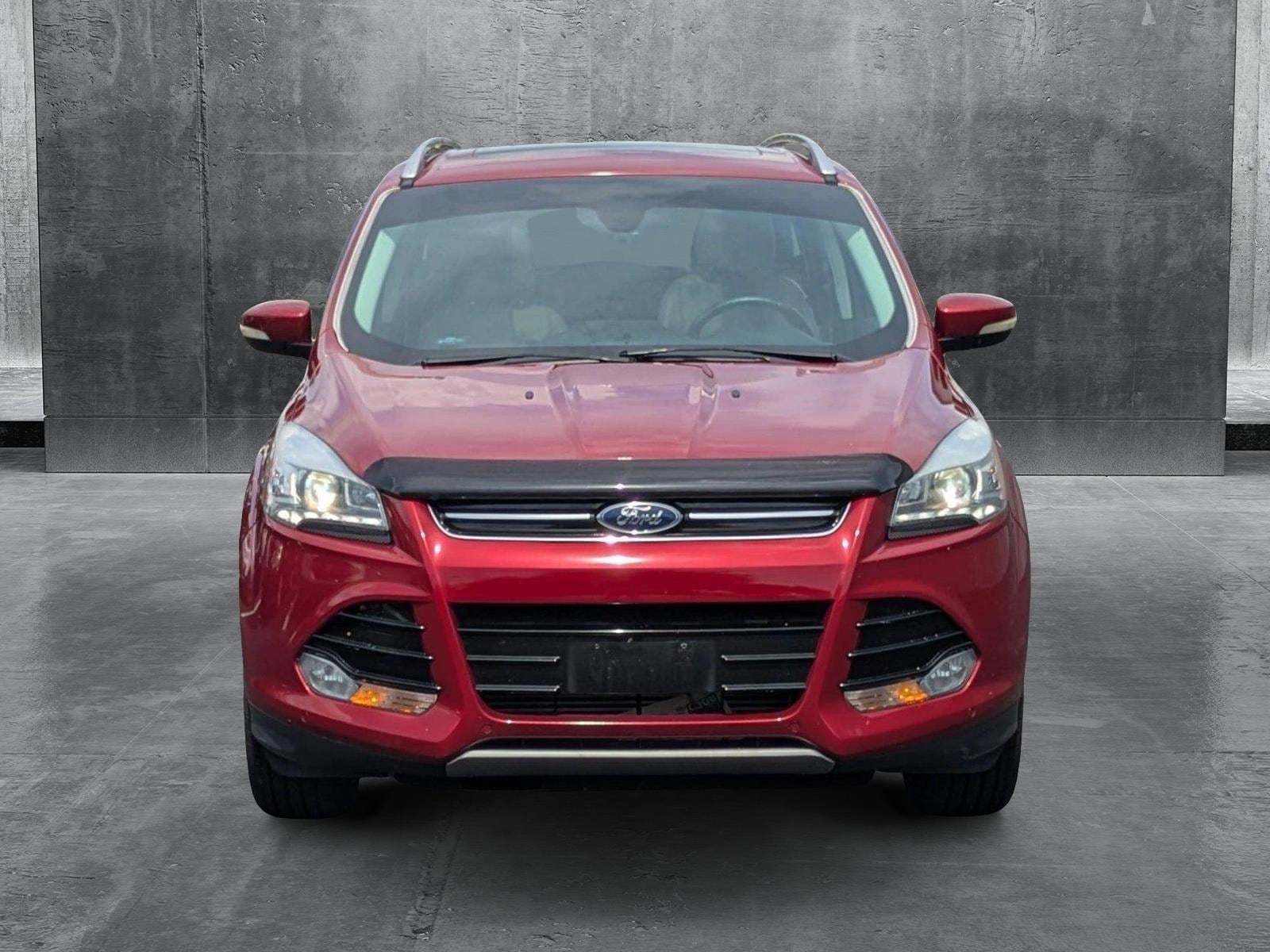 Used 2016 Ford Escape Titanium with VIN 1FMCU0J94GUB67121 for sale in Clearwater, FL
