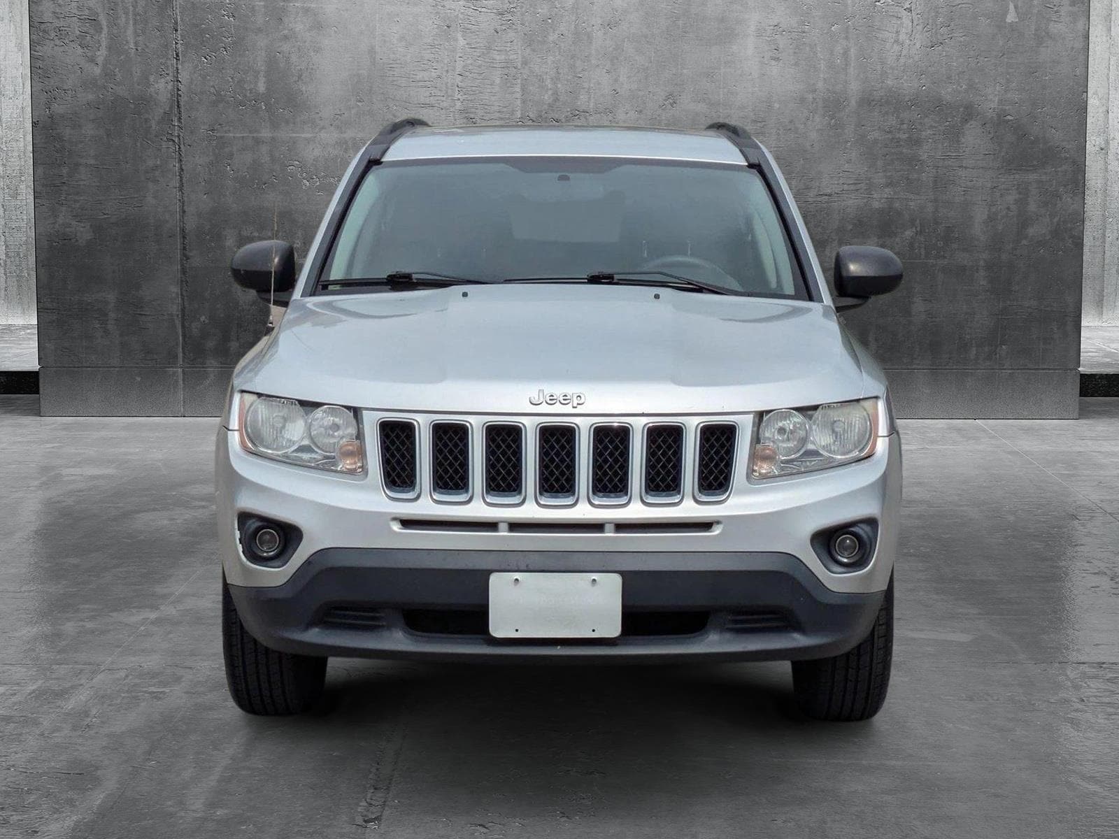 Used 2012 Jeep Compass Sport with VIN 1C4NJCBA3CD586040 for sale in Costa Mesa, CA