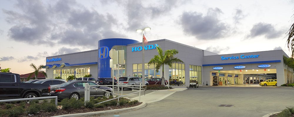 Exterior view of AutoNation Honda Hollywood in the evening