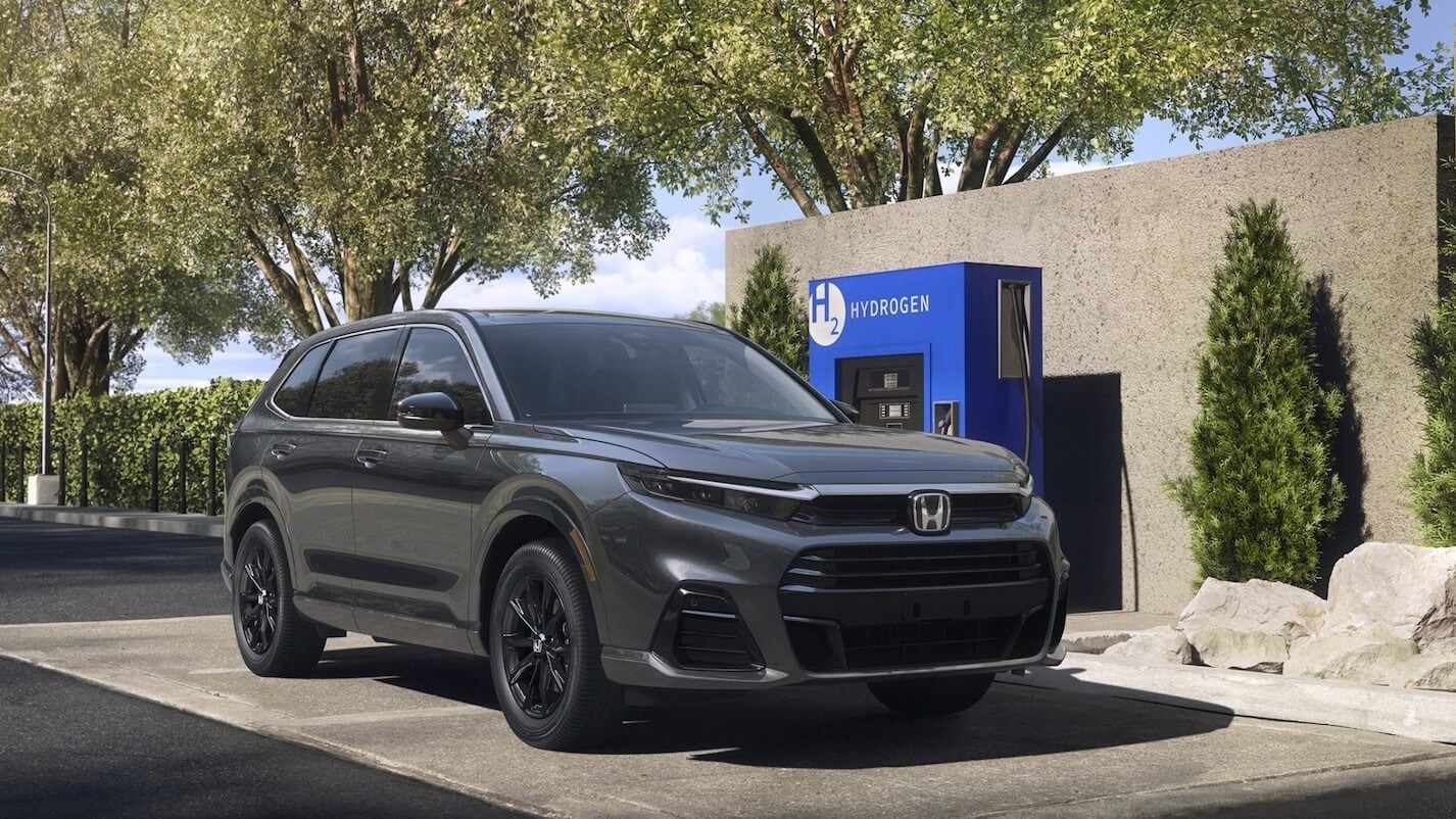 External shot of the Honda CR-V parked next to a hydrogen fuel station