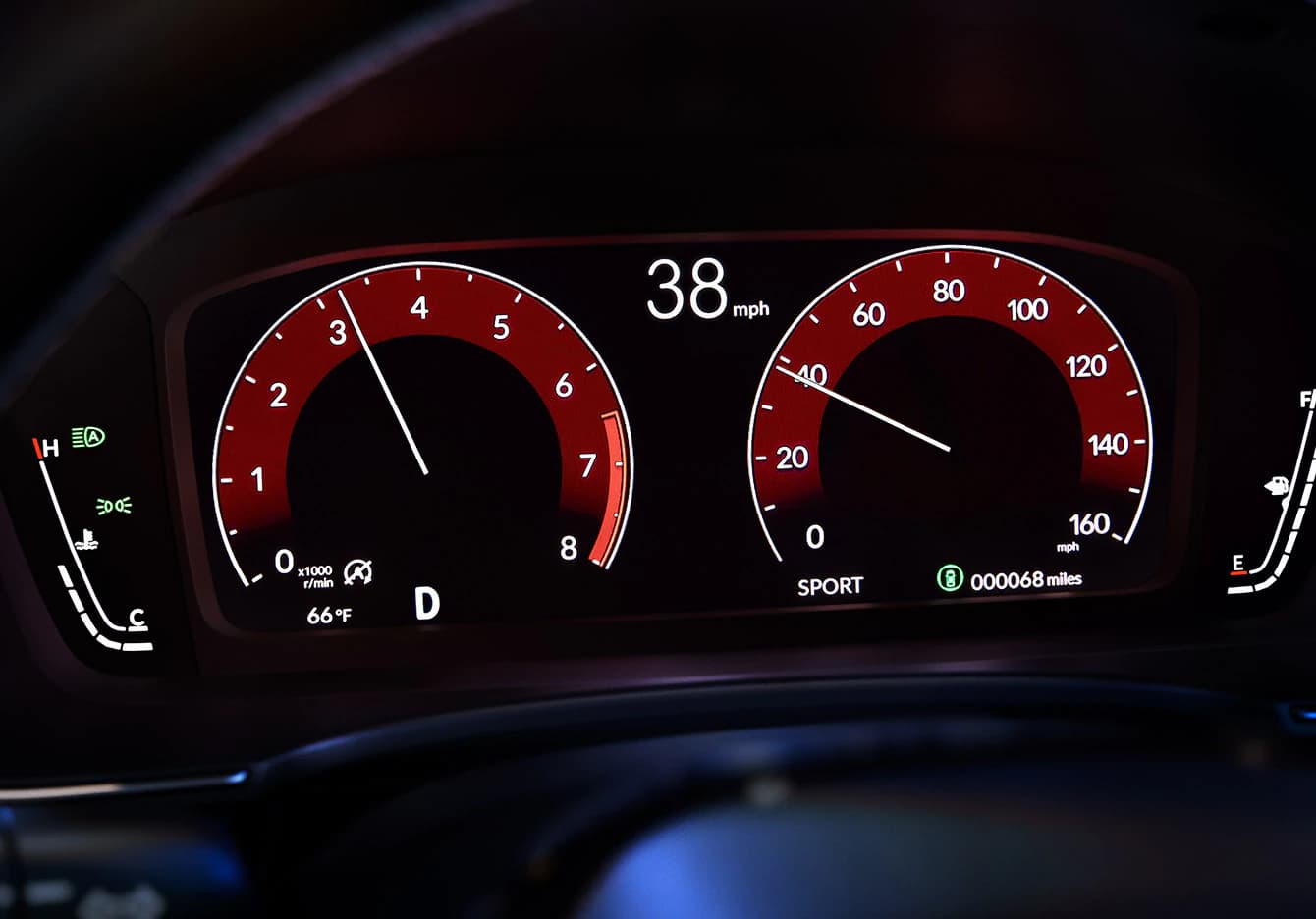 Red shade on available 10.2-inch Driver Information Interface when in Sport mode