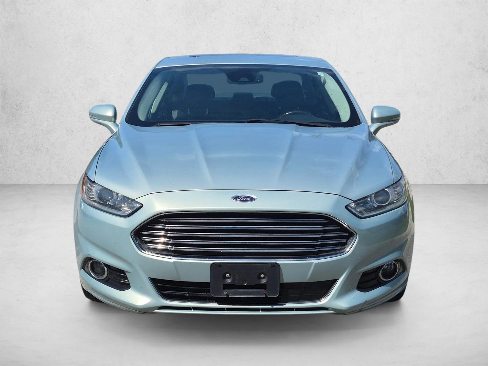 Used 2014 Ford Fusion SE Hybrid with VIN 3FA6P0LU0ER152717 for sale in Jacksonville, FL