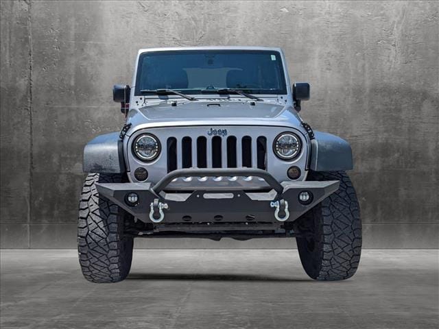 Used 2015 Jeep Wrangler Unlimited Sport with VIN 1C4BJWDG6FL658882 for sale in Jacksonville, FL