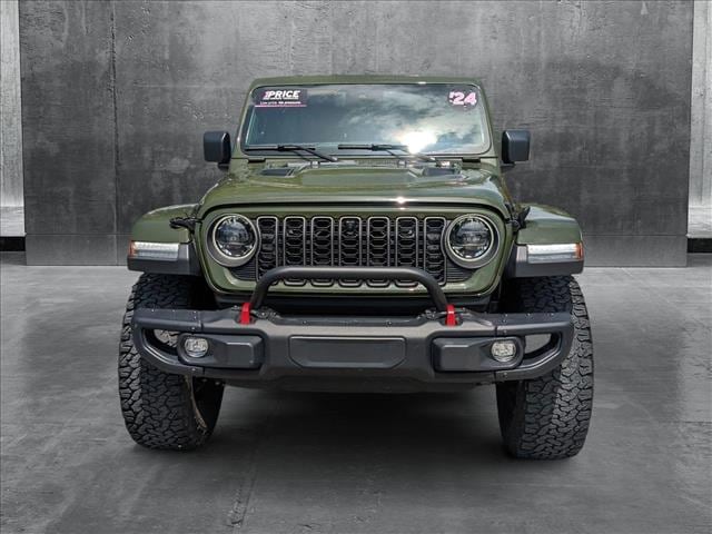 Used 2024 Jeep Wrangler 4-Door Rubicon X with VIN 1C4RJXFGXRW165601 for sale in Jacksonville, FL